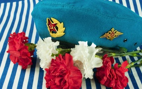 Bouquet of carnations, airborne forces and vest on May 9