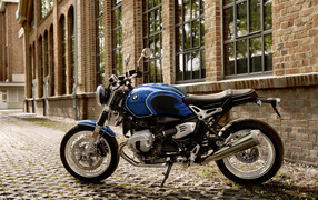 BMW R nineT motorcycle stands at home