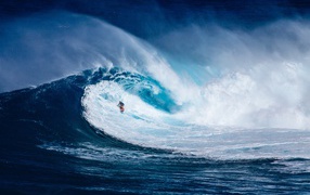 High blue wave with white surfboard
