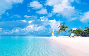 Beautiful tropical yellow sand beach under blue sky