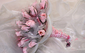 Bouquet of pink roses made of paper with candy