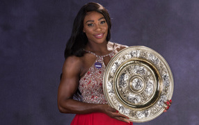 American tennis player Serena Williams with an award