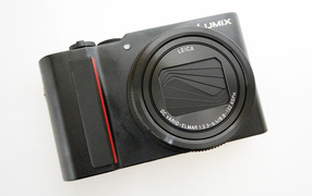 Black camera Panasonic Lumix ZS200 TZ200 on a white background