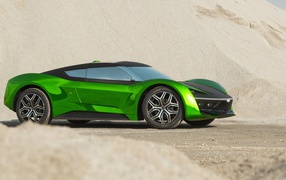Зеленый автомобиль GFG Vision 2020 года стоит на песке