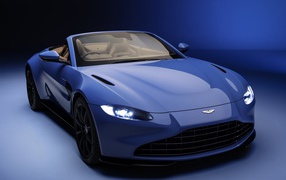 Convertible Aston Martin Vantage Roadster 2020 on a blue background