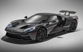 Silver sports Ford GT GT Liquid Carbon, 2020 on a gray background