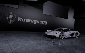 2020 sports car Koenigsegg Jesko Absolut on the background of the logo on the wall
