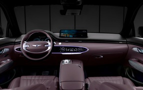 Коричневый салон автомобиля Genesis GV70 2021 года