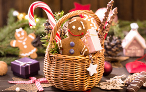 Beautiful Christmas cookies in a basket with sweets
