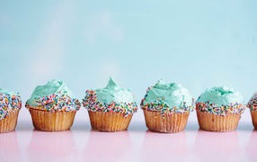 Beautiful holiday cupcakes with blue cream