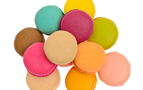 Colorful macaroon dessert on a white background