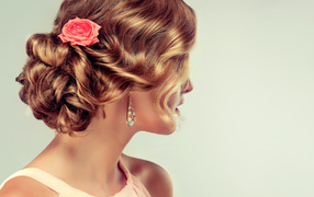 Beautiful evening hairstyle on the hair of a girl