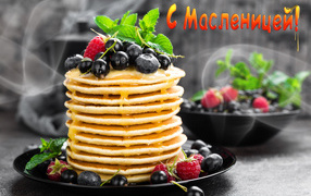 Hot pancakes with honey and berries for the holiday Maslenitsa 2020
