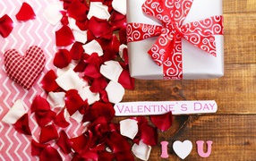 Gift and rose petals for Valentine's Day February 14