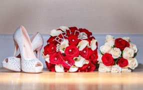 Two wedding bouquets with white shoes of the bride