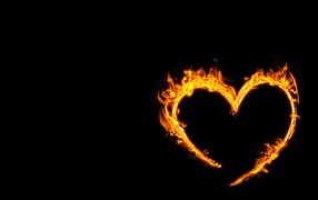Bright fiery heart on a black background