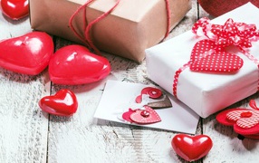 Gifts with hearts on the table