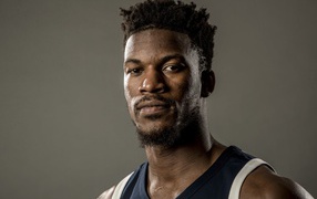 American basketball player Jimmy Butler on a gray background