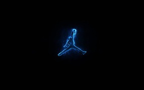 Blue silhouette of Michael Jordan on a black background