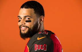 Man with a beard, American football player Mike Evans
