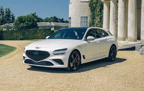 White 2021 Genesis G70 2.0T Shooting Brake in front of a building