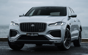 Jaguar F-Pace P250 R-Dynamic SUV, 2021, against the backdrop of the sea