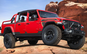 2021 Jeep Red Bare Gladiator Rubicon SUV in the Mountains