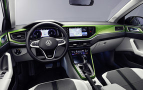 The interior of a green 2021 Volkswagen Taigun car