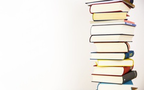 Many different books for school on a white background
