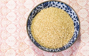 A plate of sesame seeds on the table