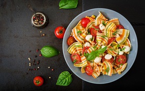 Beautiful pasta bows with tomatoes