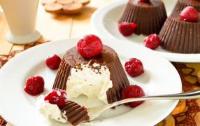 Chocolate-covered curd dessert with cherries