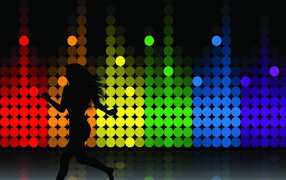 Black silhouette of a girl on a colorful background