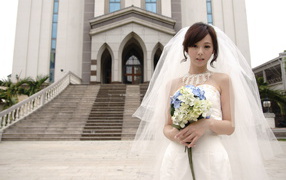 Beautiful asian girl in a wedding dress
