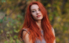 Beautiful red-haired girl with blue hair