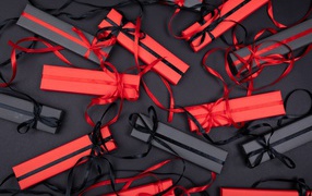 Red and black gift boxes with ribbons