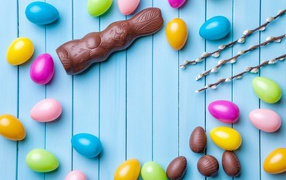 Chocolate easter sweets on blue background