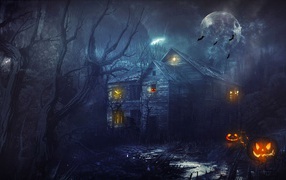 Old wooden house with pumpkins for Halloween