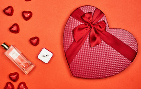 Gift, perfume and sweets in the shape of a heart for your beloved on February 14