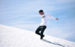 Happy man on a snowy slope