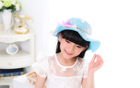 Little asian girl in white dress