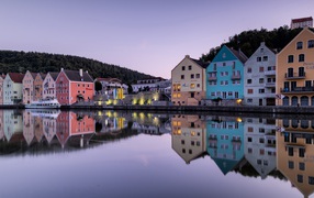 Beautiful colorful houses are reflected in the water