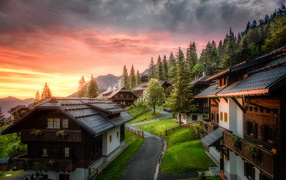 Houses by the mountains at sunset, Austria