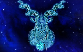 Beautiful zodiac sign capricorn on blue background