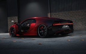 Red expensive car Bugatti Chiron rear view