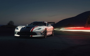Sports Dodge Viper ACR on the road at night