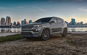 Beautiful car Jeep Compass High Altitude, 2022 against the backdrop of the city