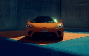 Orange car McLaren GT front view