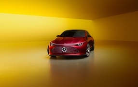 Красный автомобиль Mercedes-Benz Concept CLA Class 2024 года