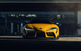 Yellow car Supra DT front view